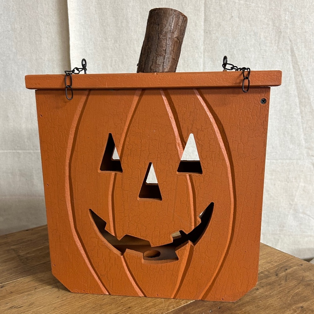 Wooden pumpkin with insert for candle.